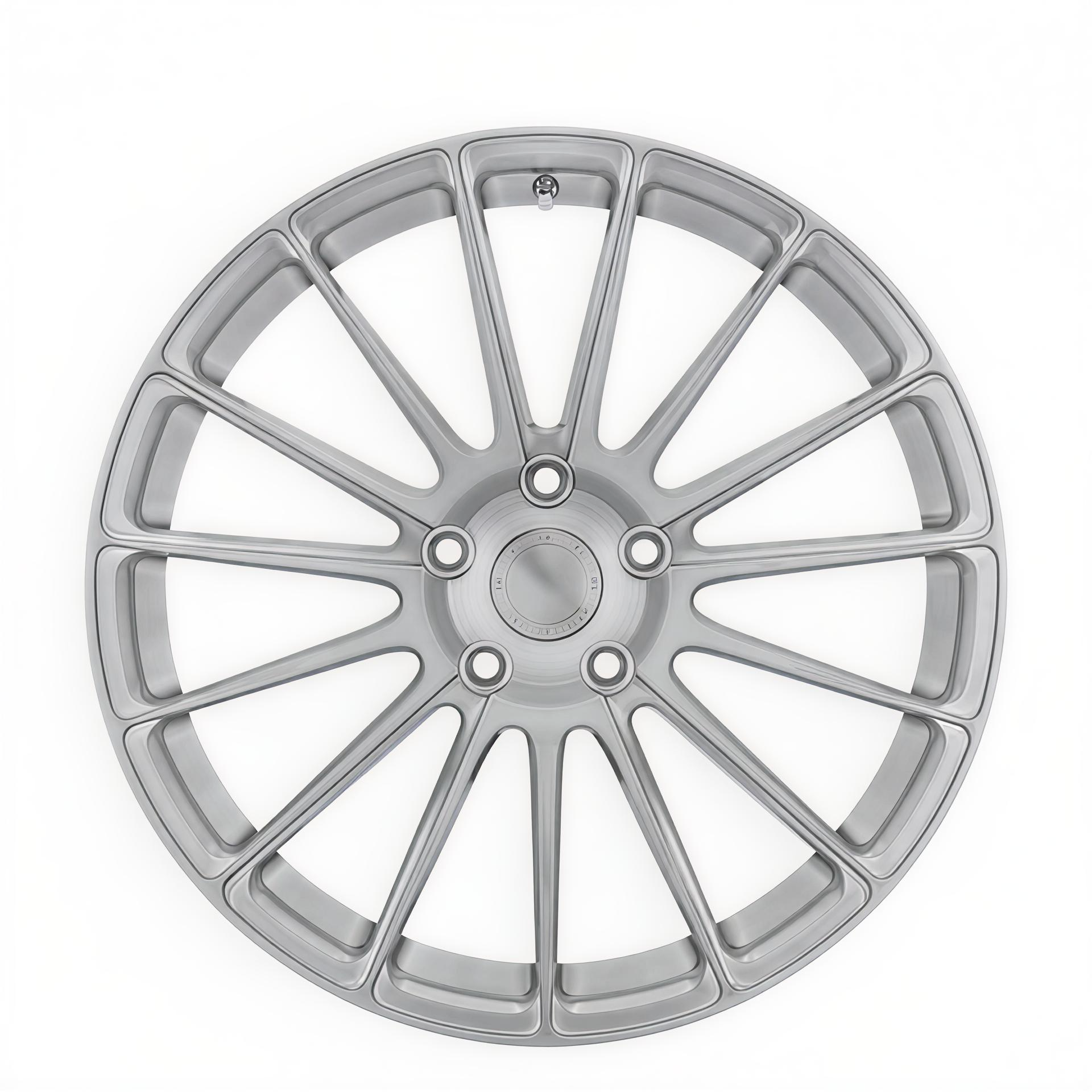 Silver multispoke forged alloy wheel on white background.