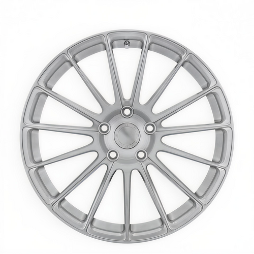 Silver multispoke forged alloy wheel on white background.