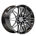 Black diamond cut forged wheel on white background.