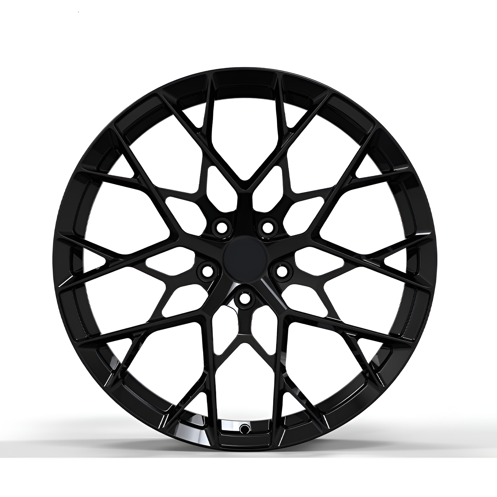 Black forged alloy wheel on white background.