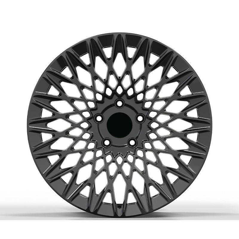 Black lattice style forged wheel on white background.