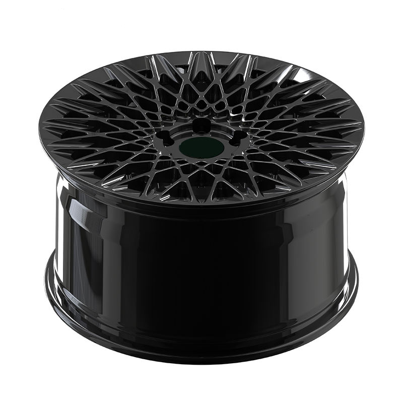 Black lattice style forged wheel on white background.