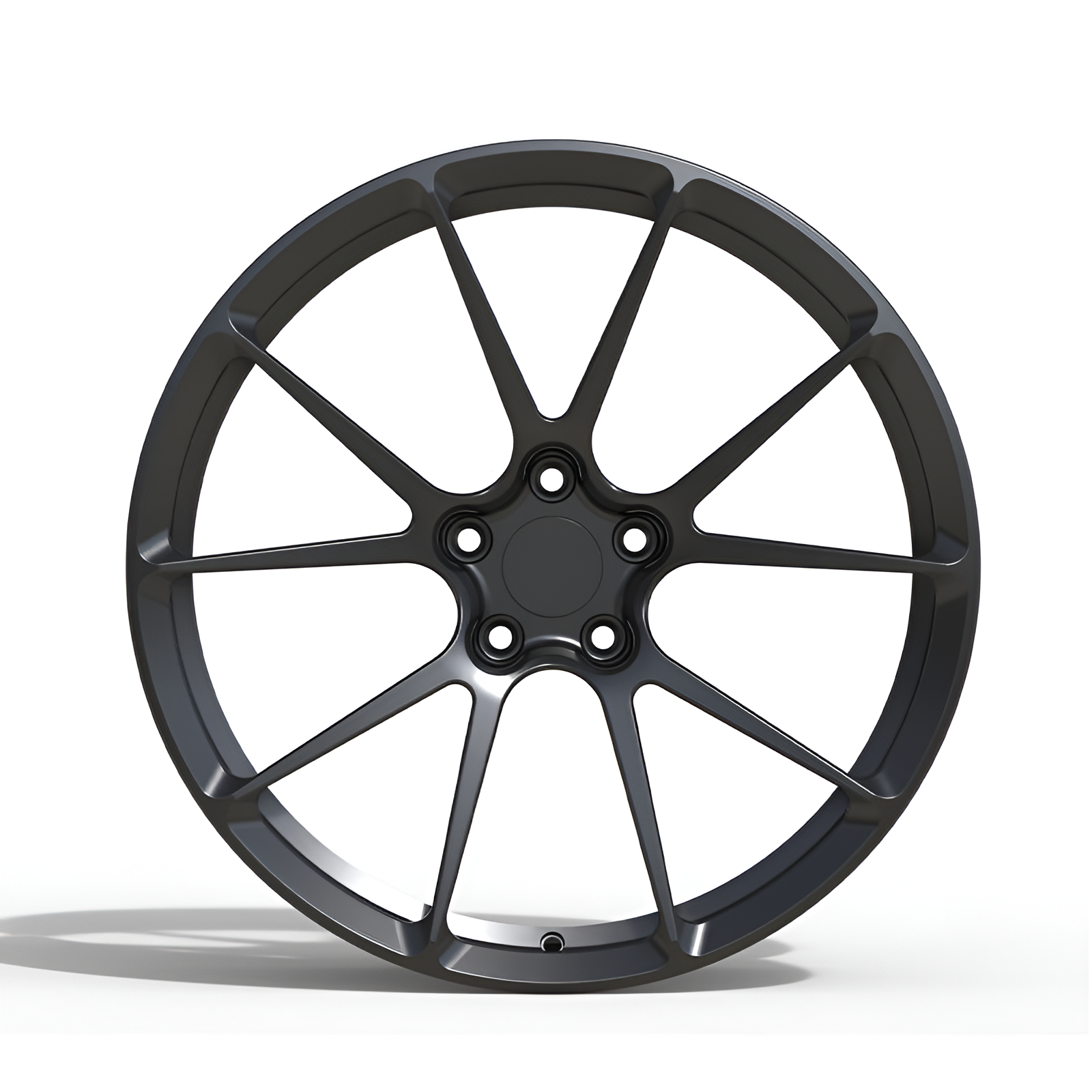 Black forged alloy wheel on white background