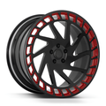 Black turbine forged alloy wheel with red accents on white background