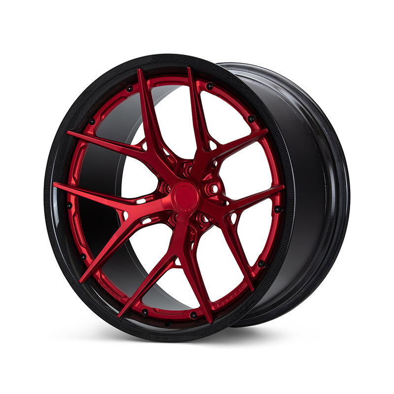 Red carbon barrel forged alloy wheel on white background