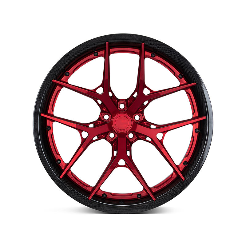 Red carbon barrel forged alloy wheel on white background